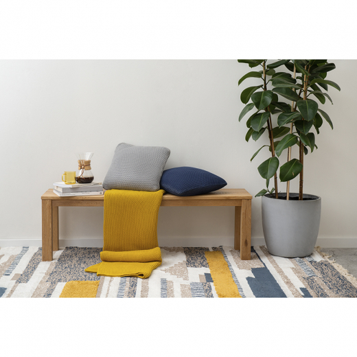 Плед из хлопка жемчужной вязки горчичного цвета из коллекции Essential, 130х180 см